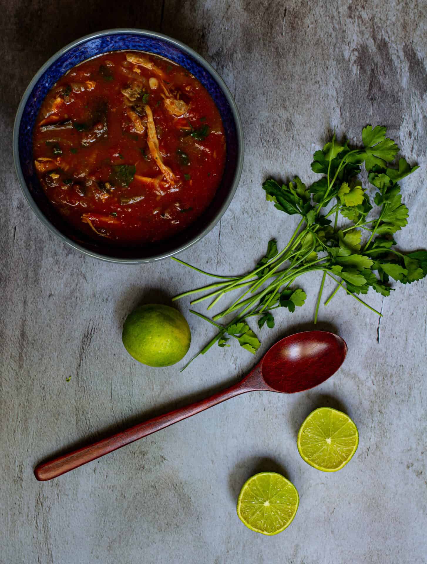 Photo of soup with limes and cilantro