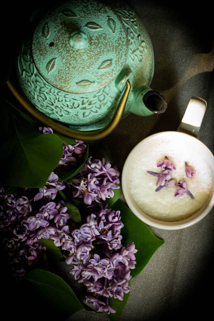 teapot and lilacs with a cup of london fog