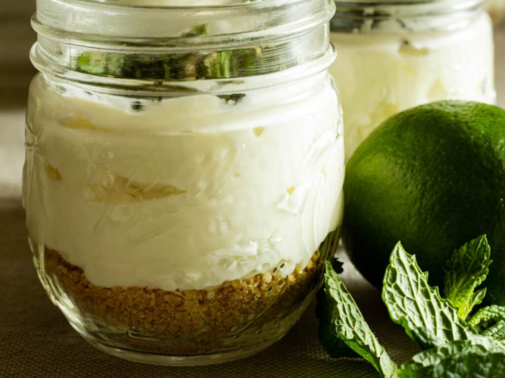 closeup of no bake cheesecake in a jar