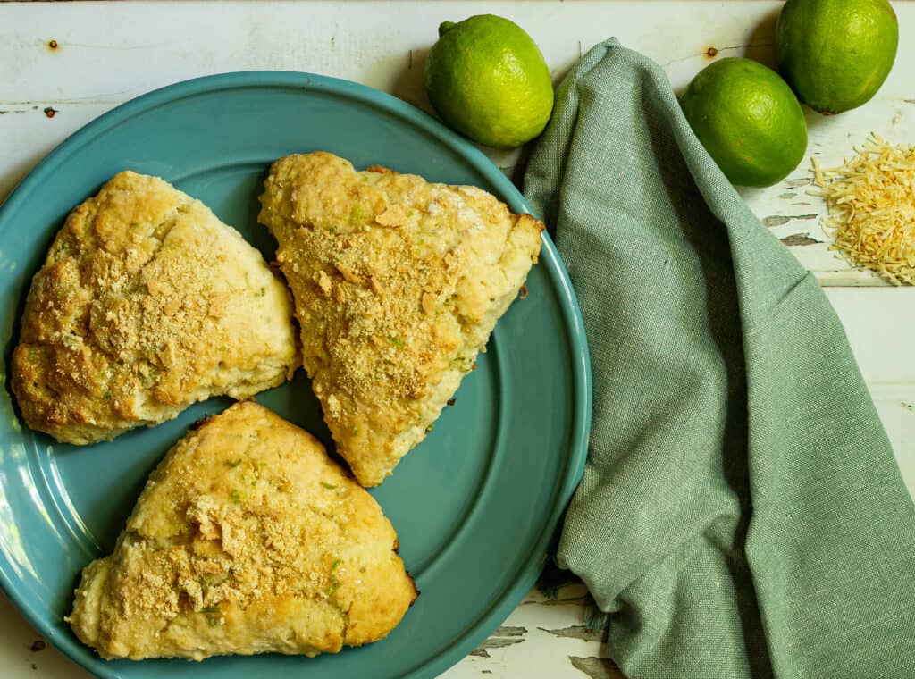 scones on a blue plate with a green napkin