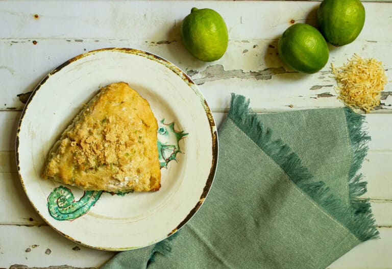 scone with a napkin and limes