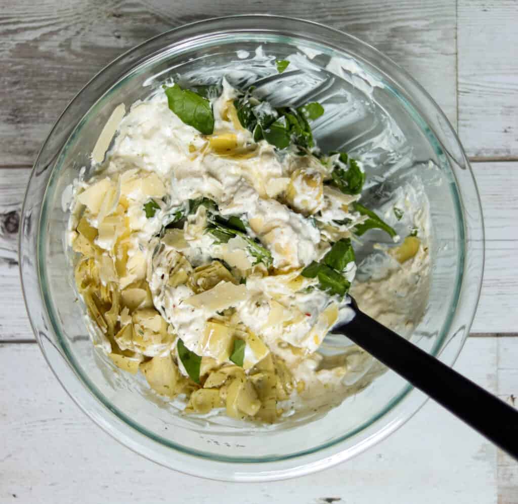 dip ingredients being stirred together