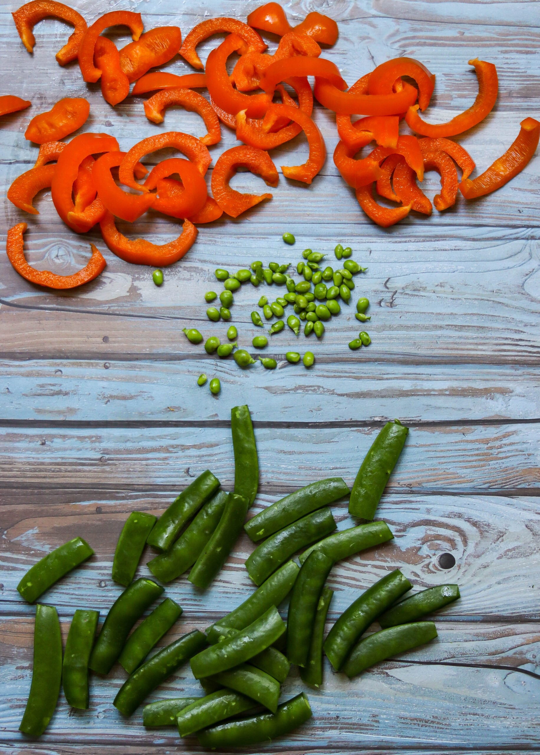 chopped vegetables on a blue background