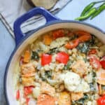 butternut squash and chickpea curry in a blue pot.
