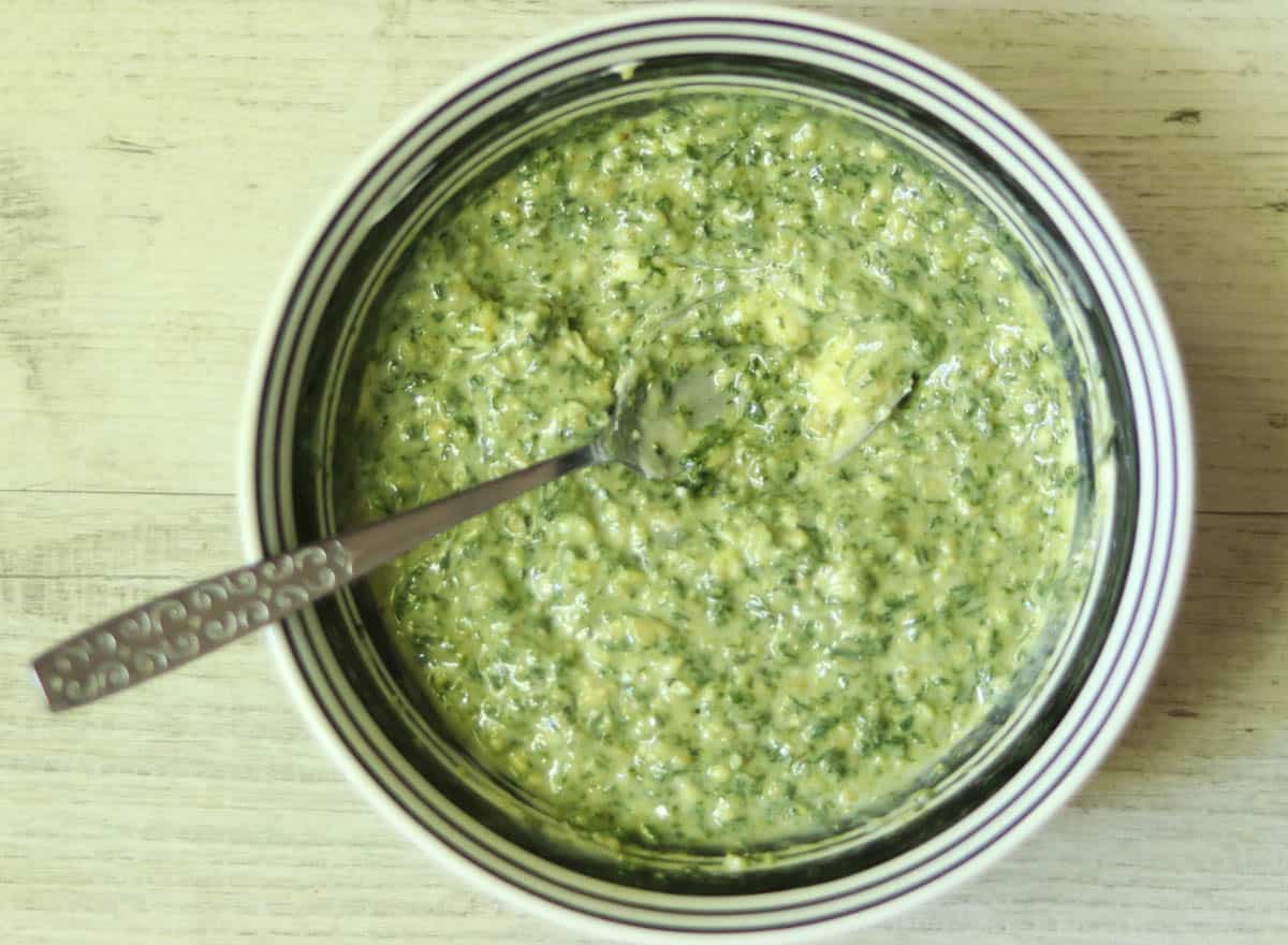 photo of pesto butter in a bowl.