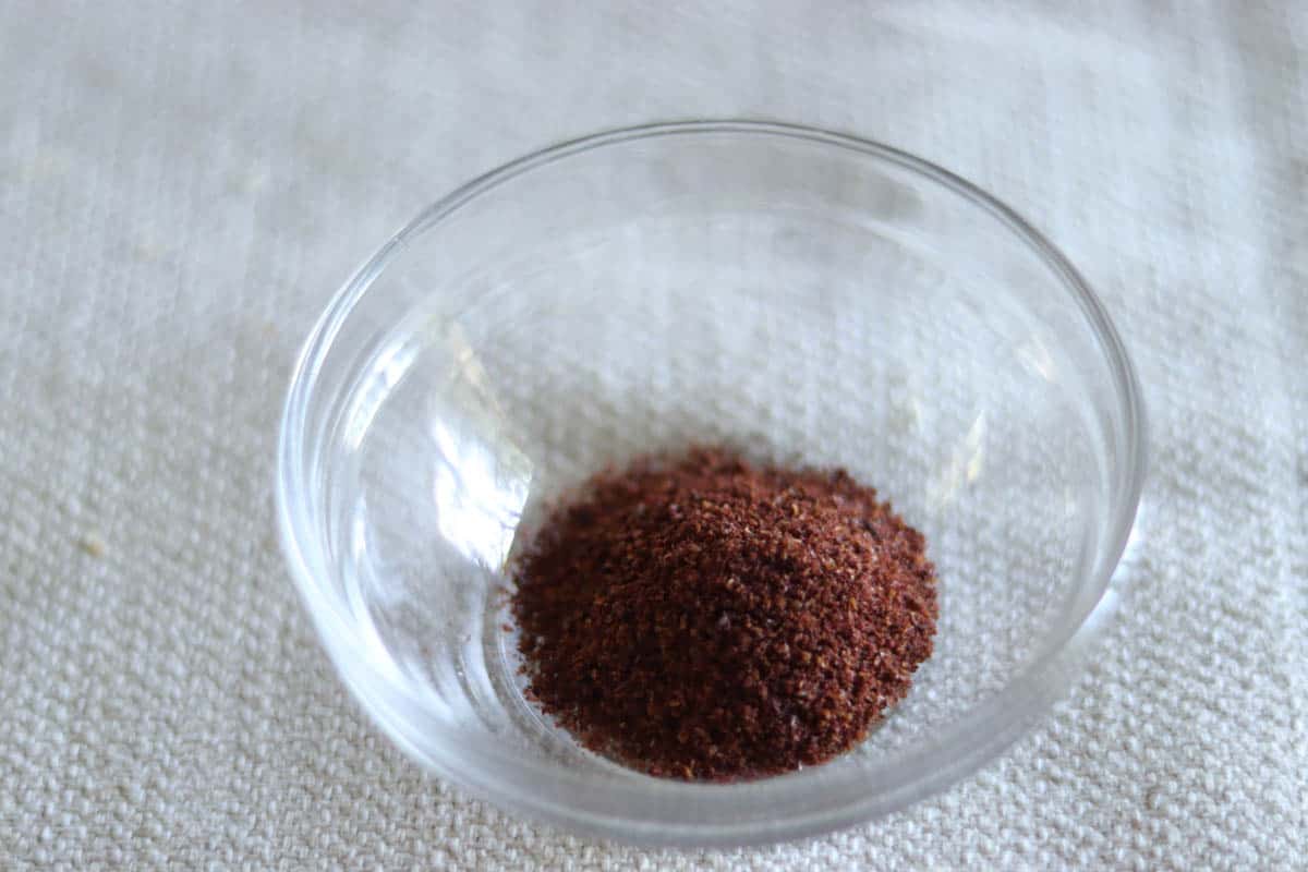 ground sumac in a small glass dish.