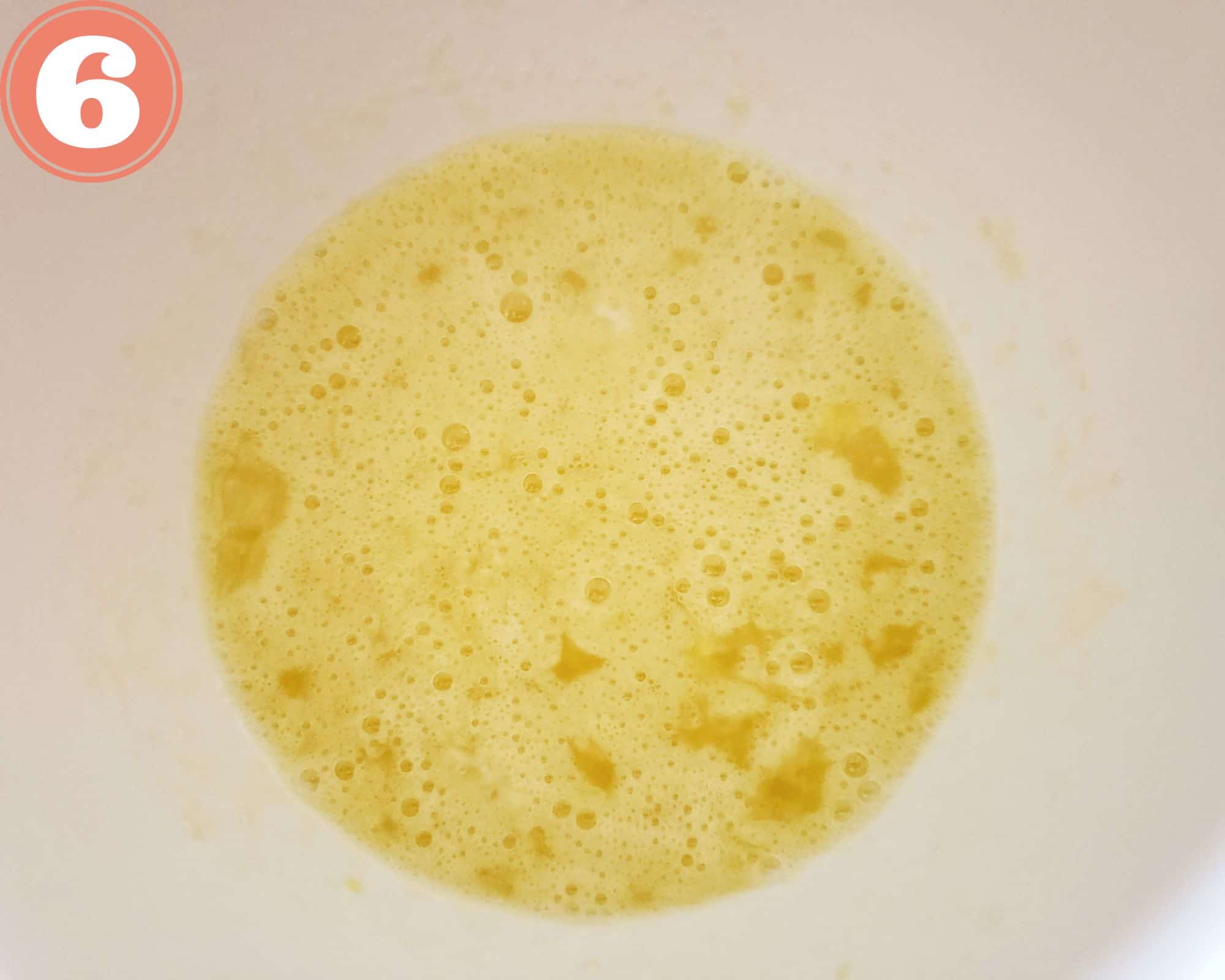 eggs and sugar in a bowl.