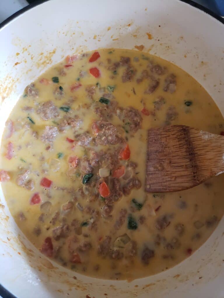Add the milk to the pot to make the gravy.