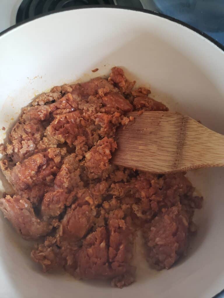 Browning the chorizo to make the gravy.