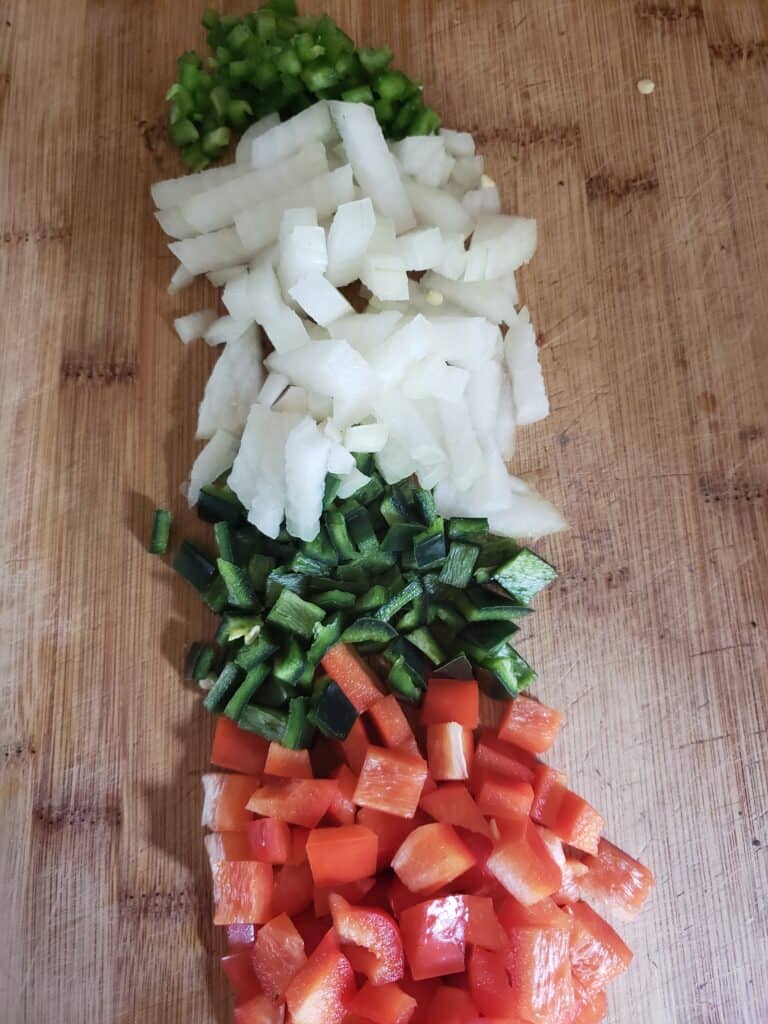 Chopped red bell pepper, poblano, onion, and jalapeno.