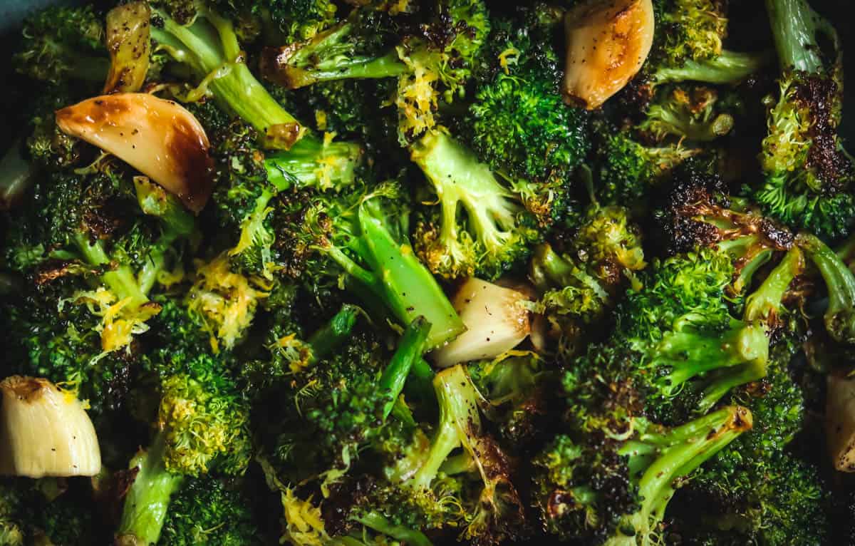 Closeup photo of charred broccoli.