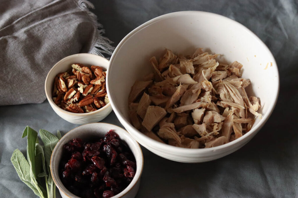 Ingredients for Turkey Salad with cranberry and sage.