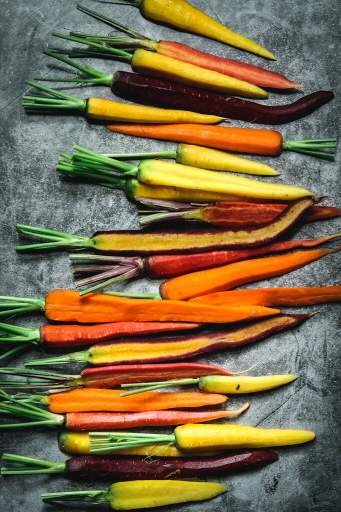 Cut rainbow carrots ready to roast.
