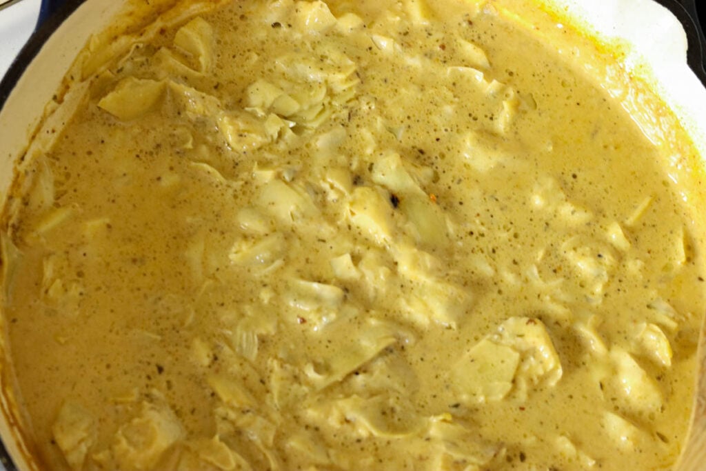 Artichoke hearts added to the sauce.