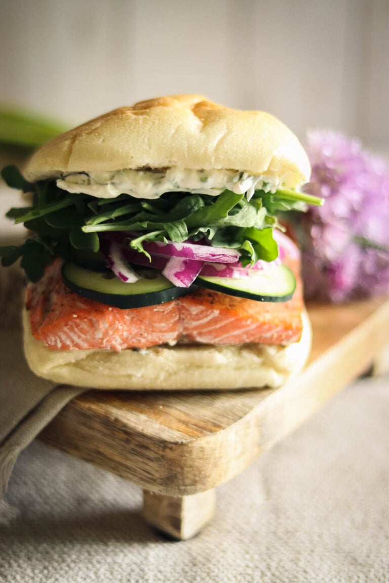 Salmon sandwich with cream cheese spread.