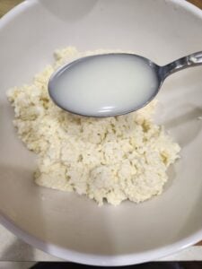 Adding whey to ricotta to add creaminess.