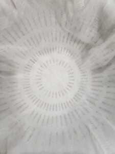 Colander lined with cheesecloth.