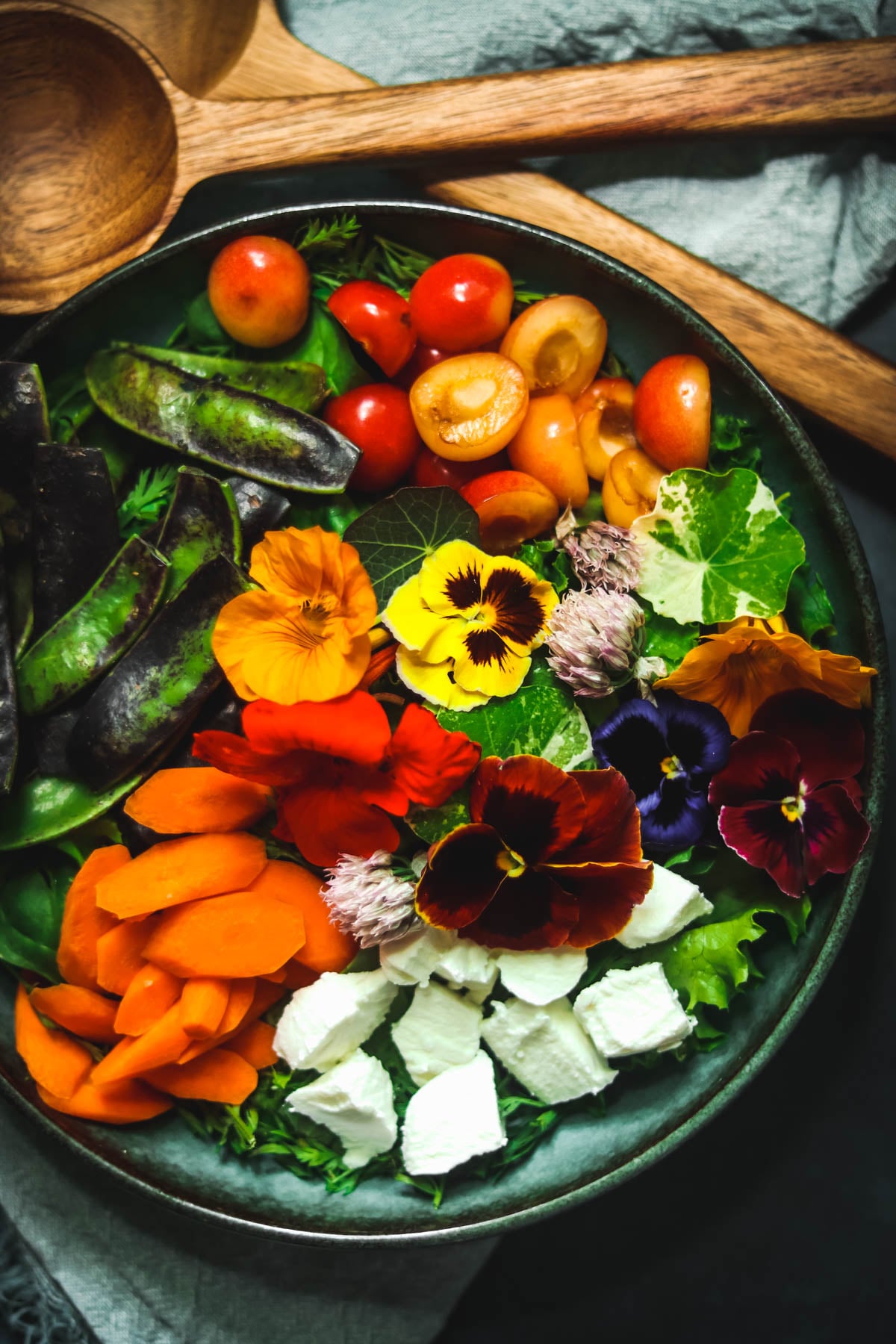 Salad in a green bowl.