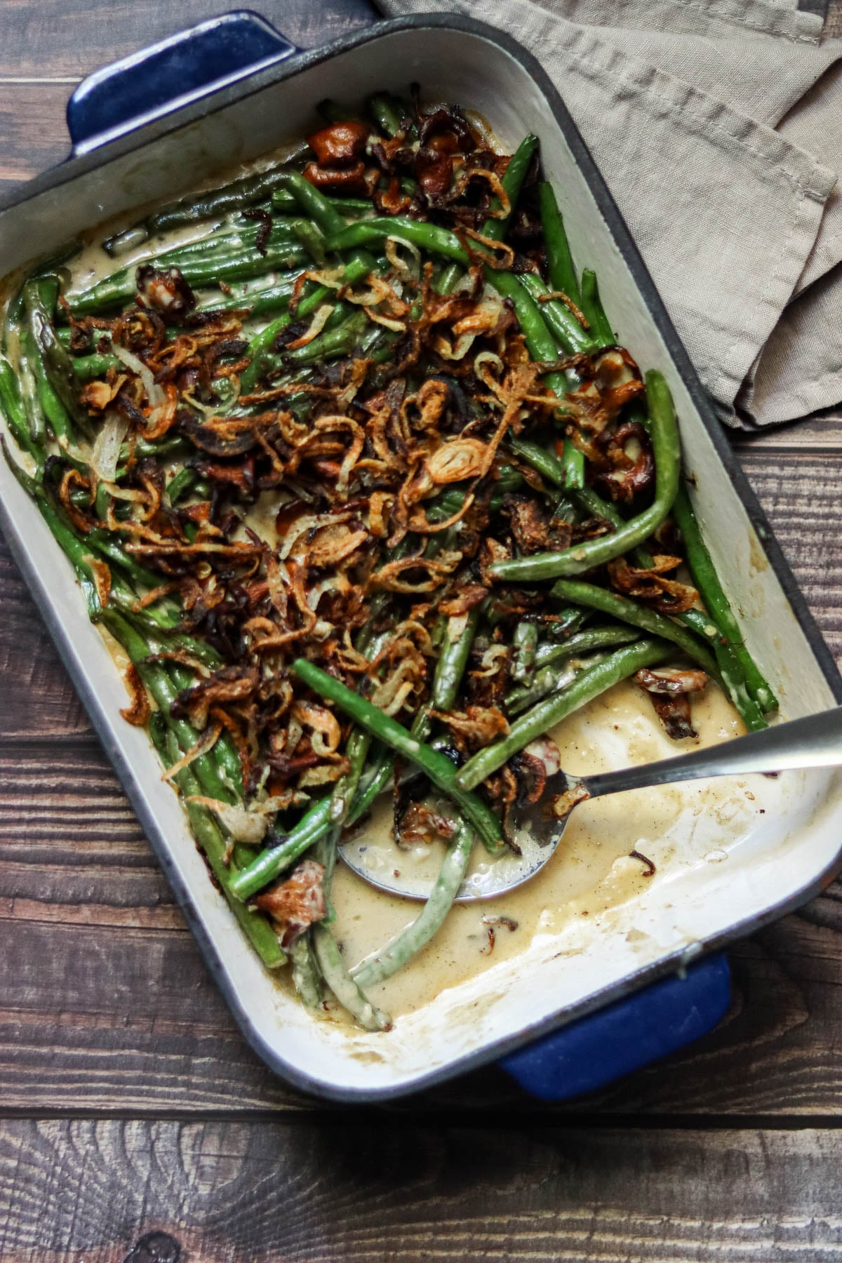 Green bean casserole in a blue dish.