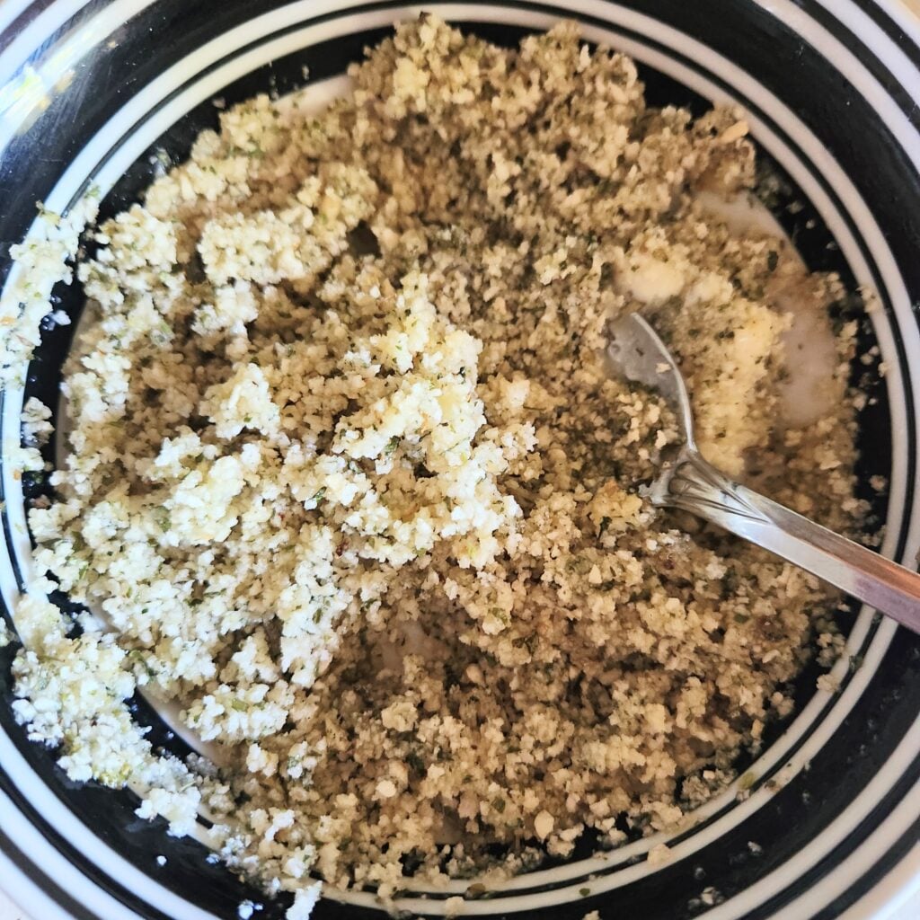 Stir melted butter in to panko.