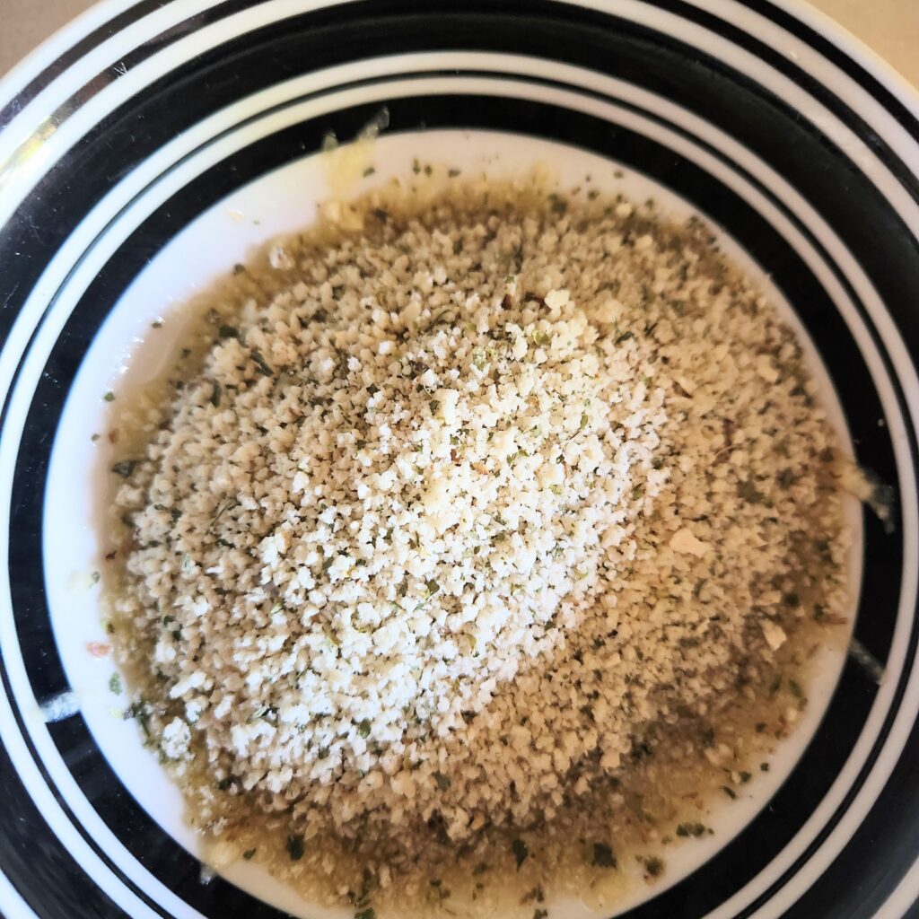 Add seasoning to panko bread crumbs.