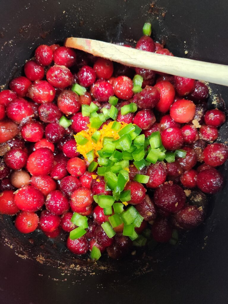 Adding the rest of the ingredients to the saucepan.