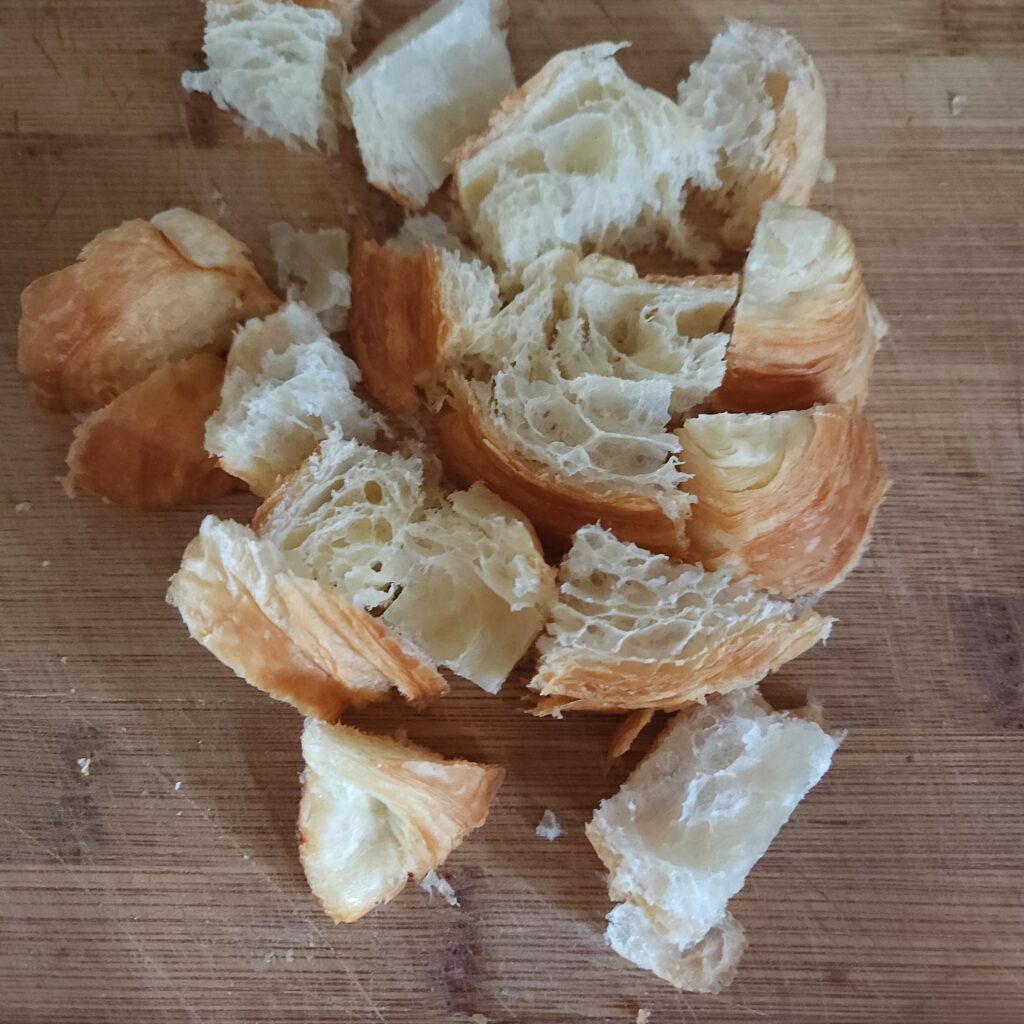 Croissants cut into cubes.