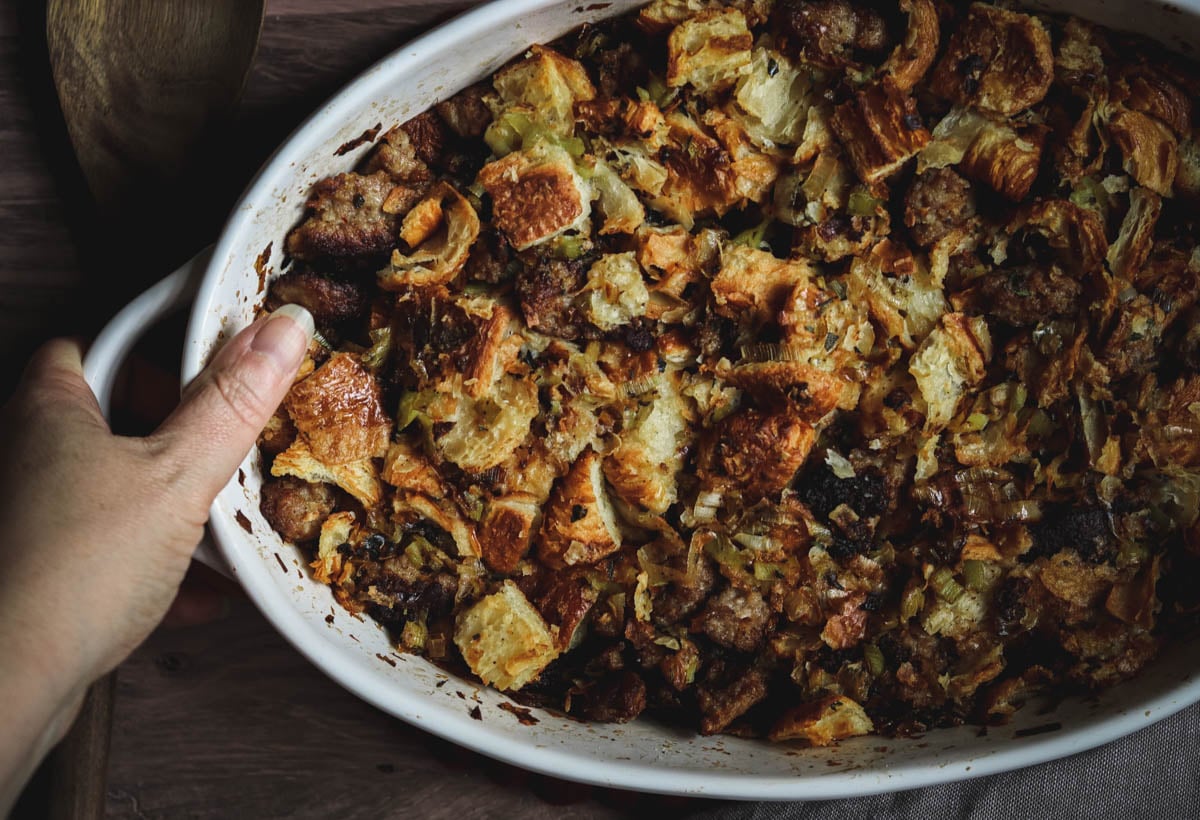 Dish of croissant stuffing on a table.
