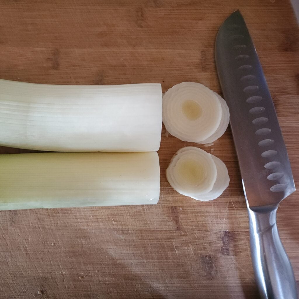 Leeks on a cutting board.