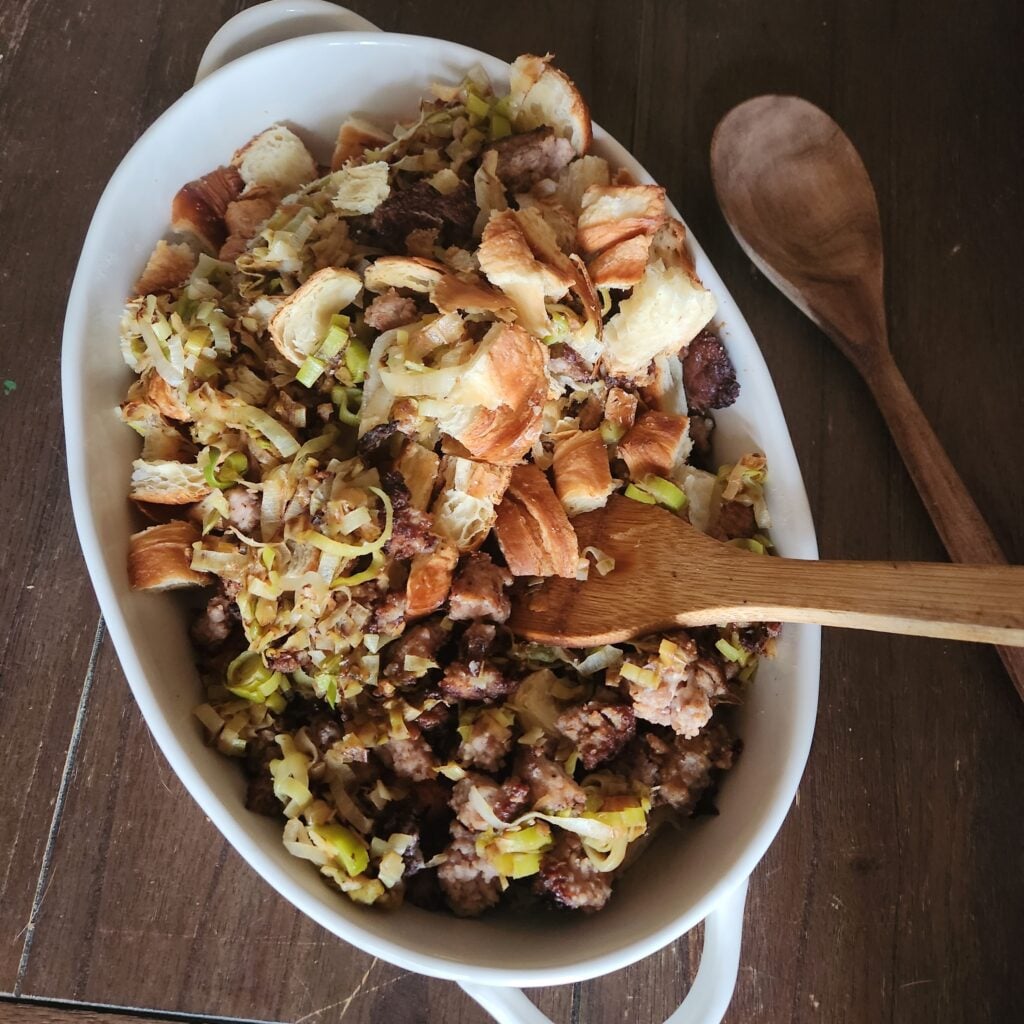 Stirring the stuffing ingredients together.