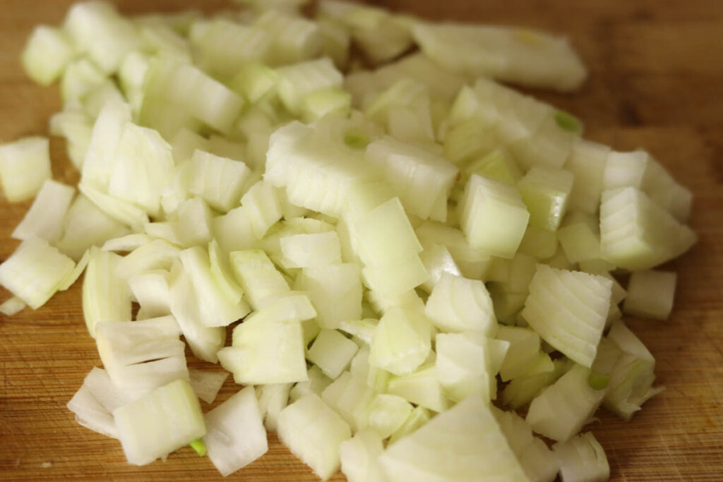 Chopped onion and garlic for chili.