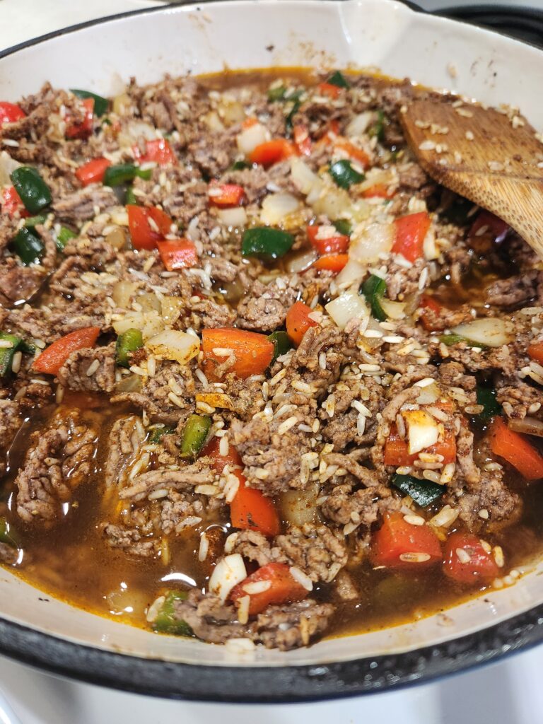 Beef stock added to the beef and veggies.